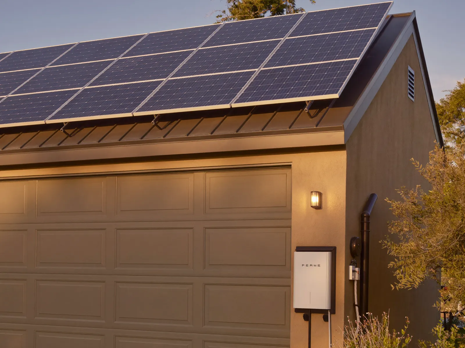 Adelaide home with solar panels and a home battery beside the switchboard