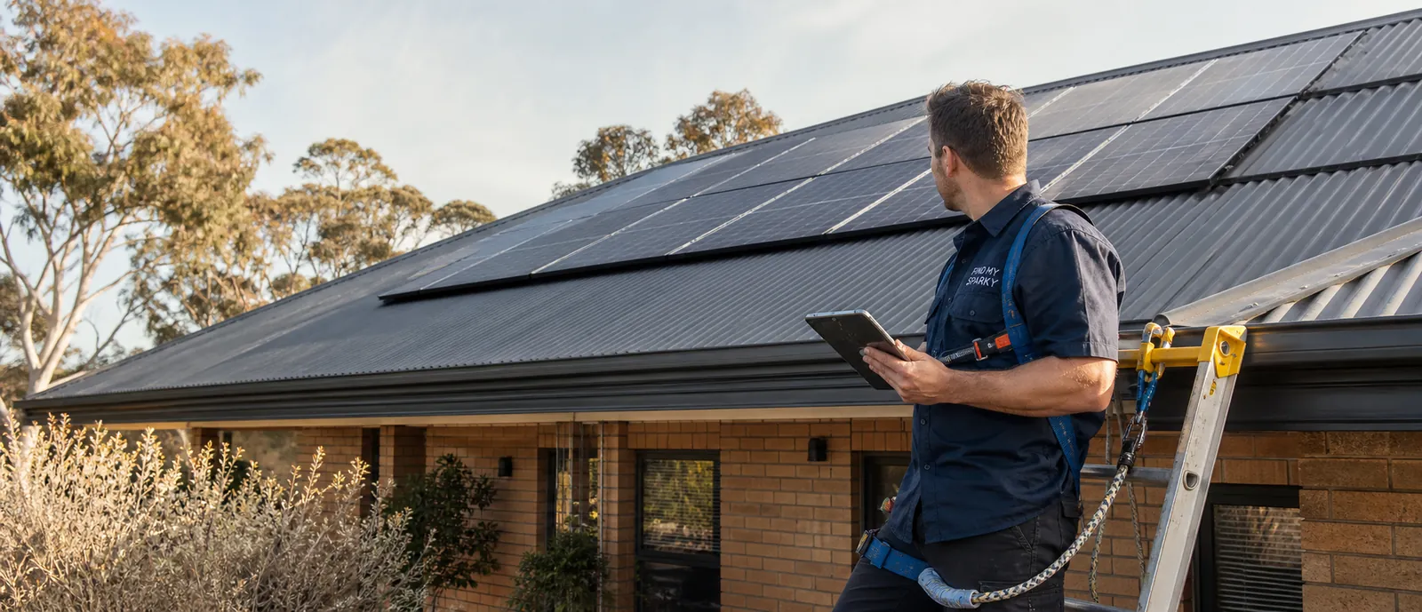 Completed rooftop solar panel system being inspected on a South Australian home
